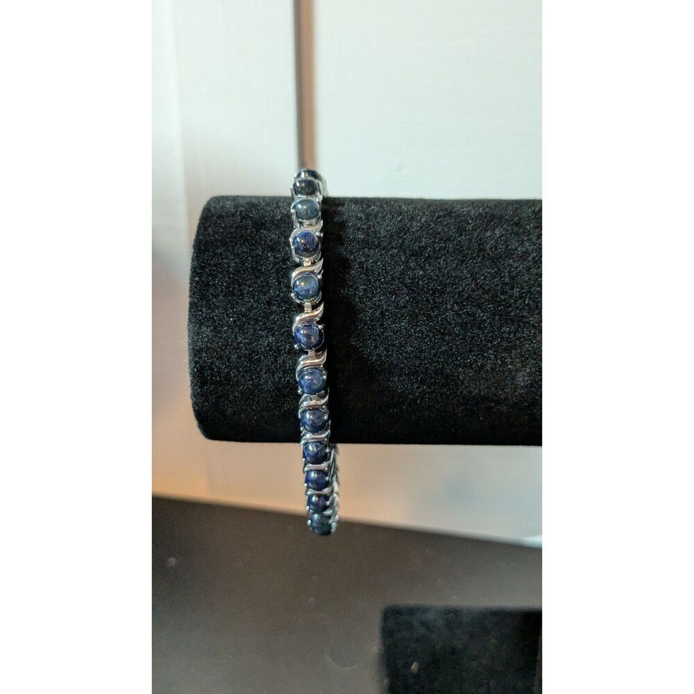 16.69CT Cabochon Blue Star Sapphire, Rhodium over Sterling Silver Bracelet 8”